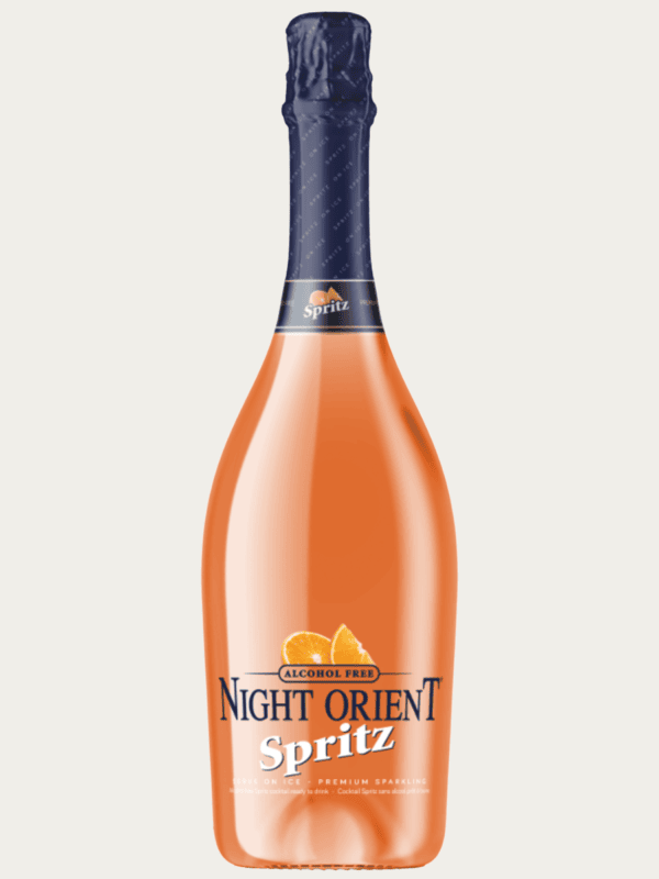 Bezalkoholowy koktajl musujący Night Orient Spritz w klasycznej butelce szampańskiej.